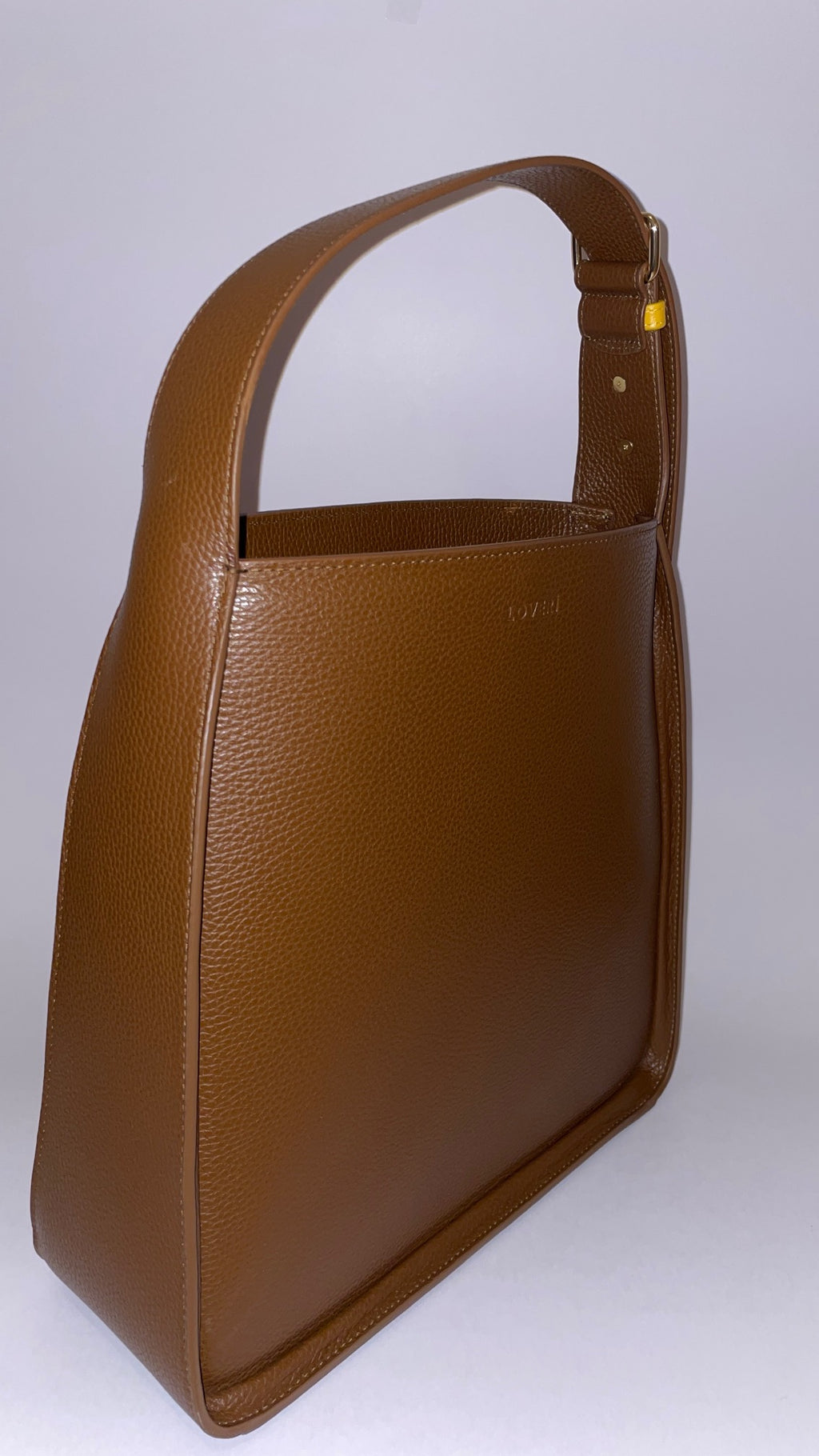 Borsa Carry Medium in pelle di Vitello Martellata Nocciola